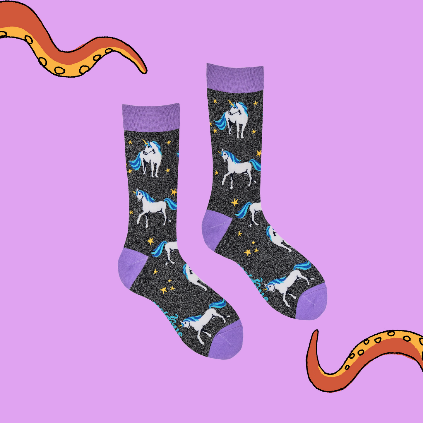 
                  
                    A pair of socks depicting unicorns. Glittery black legs, purple cuff, heel and toe.
                  
                