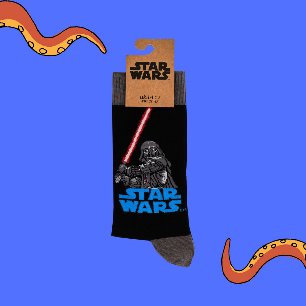 
                      
                        A pair of socks featuring Darth Vader. Black legs, grey toe, heel and cuff. 
                      
                    