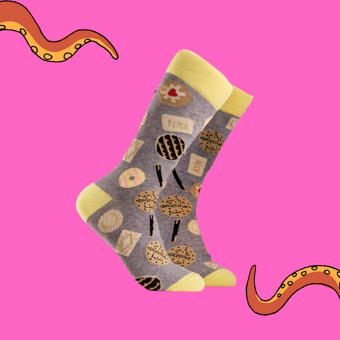Biscuits Socks. A pair of socks depicting retro and classic British biscuits. Grey legs, yellow cuff, heel and toe.