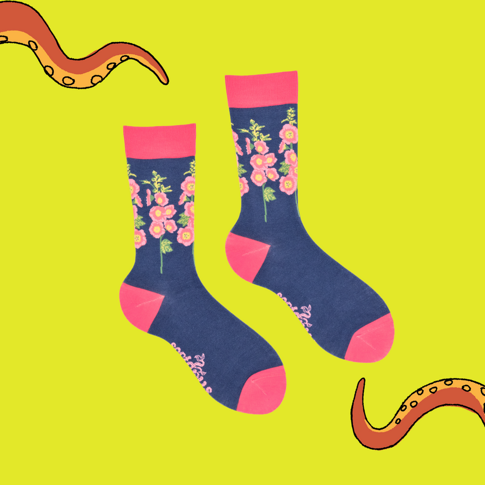 
                      
                        A pair of socks depicting hollyhocks. Blue legs, pink cuff, heel and toe.
                      
                    