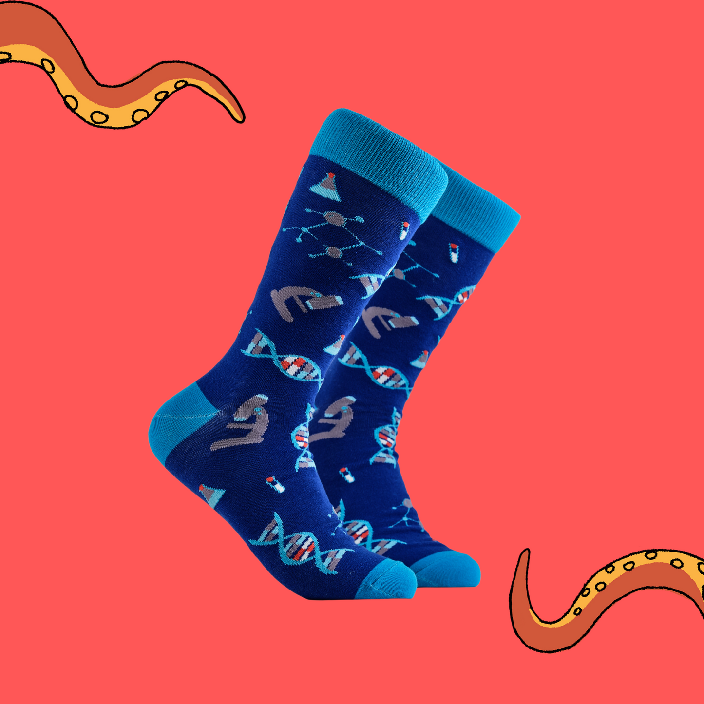 A pair of socks depicting DNA and microscopes. Blue legs, light blue cuff, heel and toe.