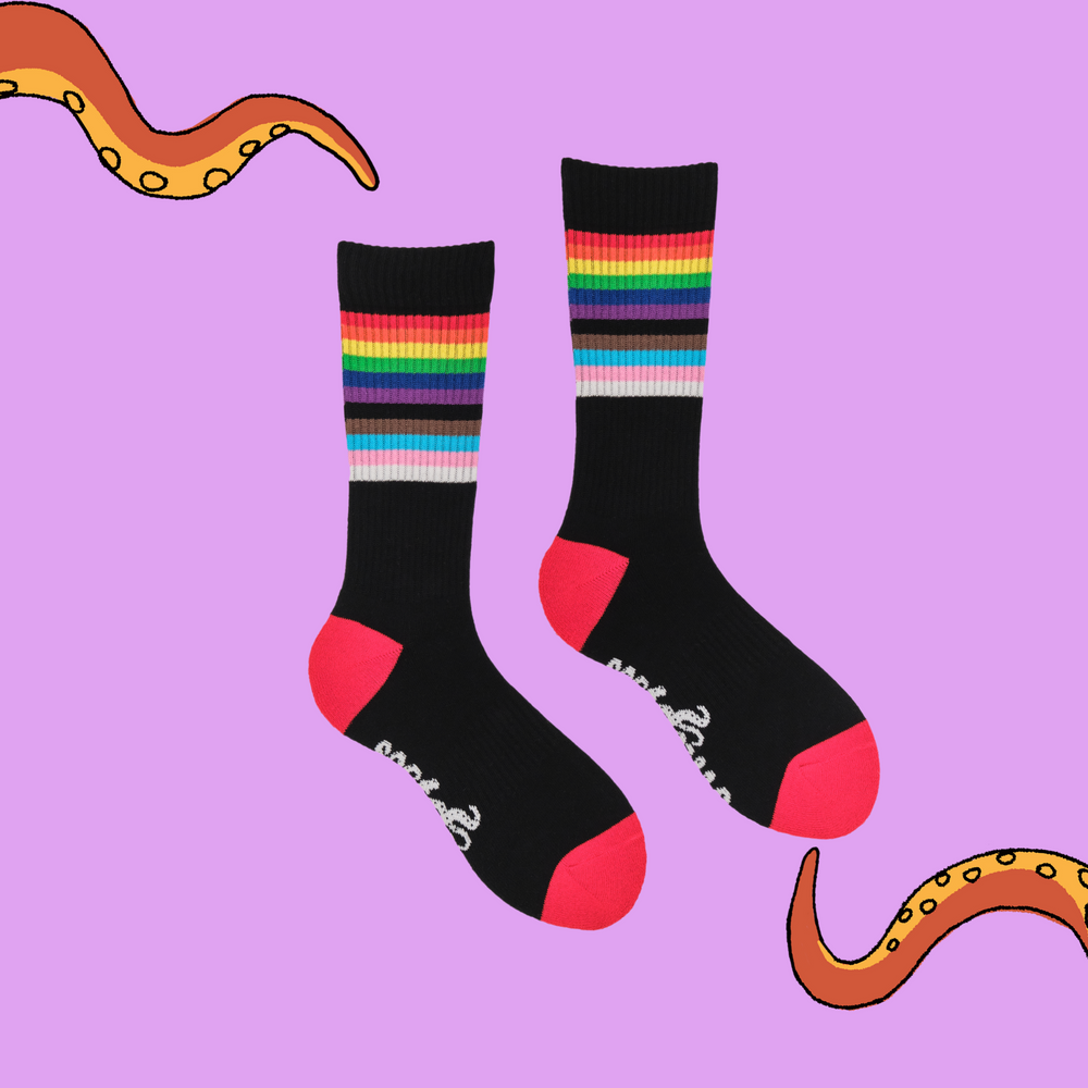 
                      
                        A pair of socks depicting the pride flag. Black legs, black cuff, red heel and toe.
                      
                    