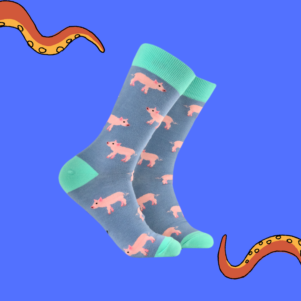 
                      
                        A pair of socks with a pilet motif. Blue legs, green heel, toe and cuff. 
                      
                    