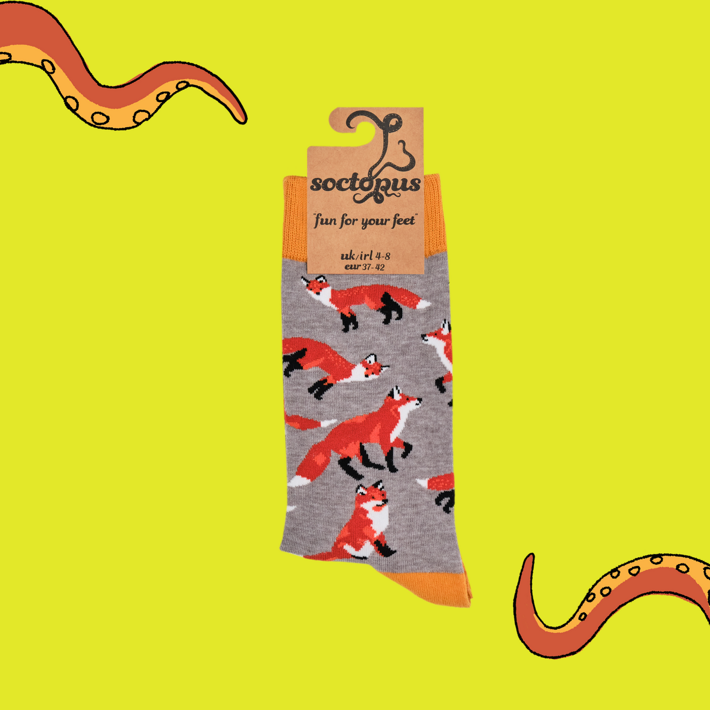 
                  
                    A pair of socks depicting playful foxes. Grey legs, orange cuff, heel and toe.
                  
                