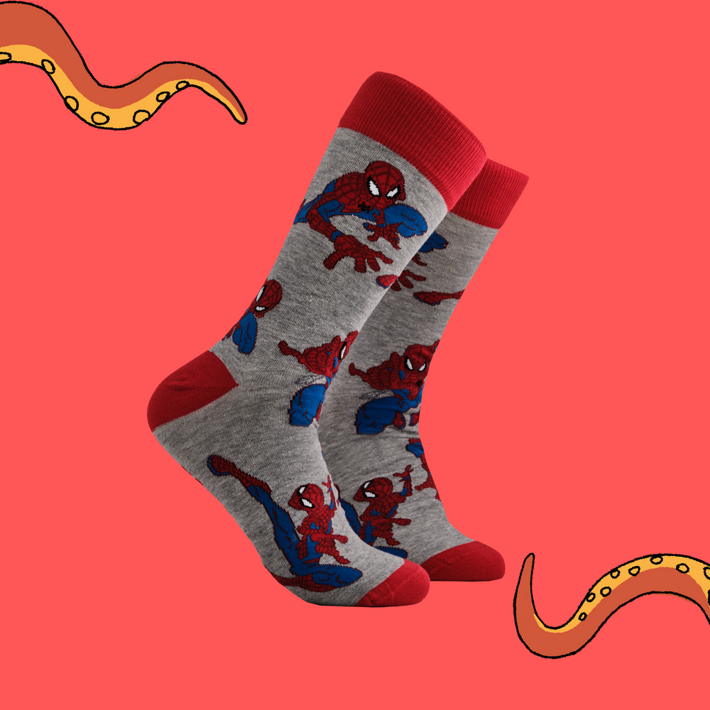 
                      
                        A pair of socks depicting the lovable hero Spider-Man. Grey legs, red toe, cuff and heel.
                      
                    