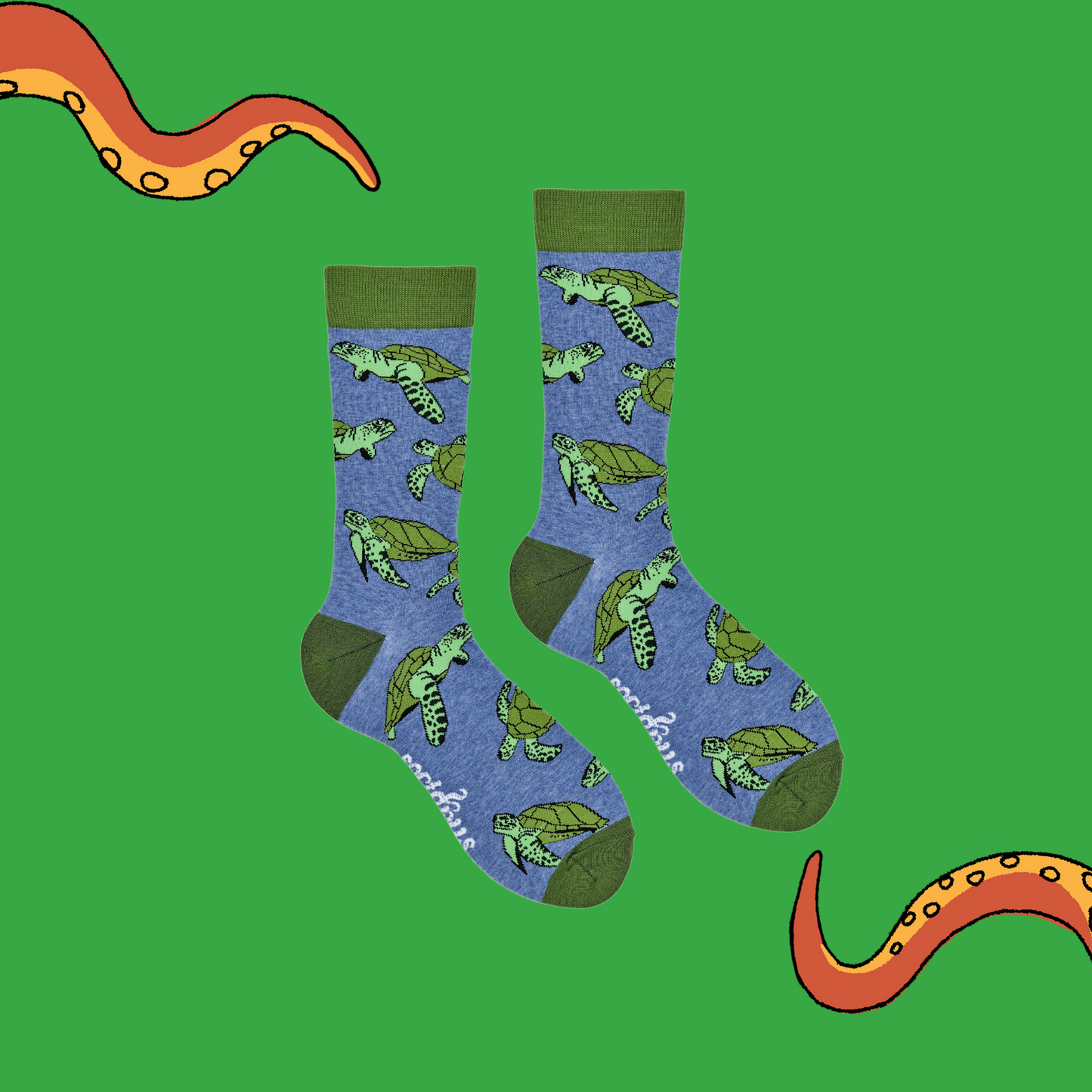 
                  
                    A pair of socks depicting sea turtles. Blue legs, green cuff, heel and toe.
                  
                