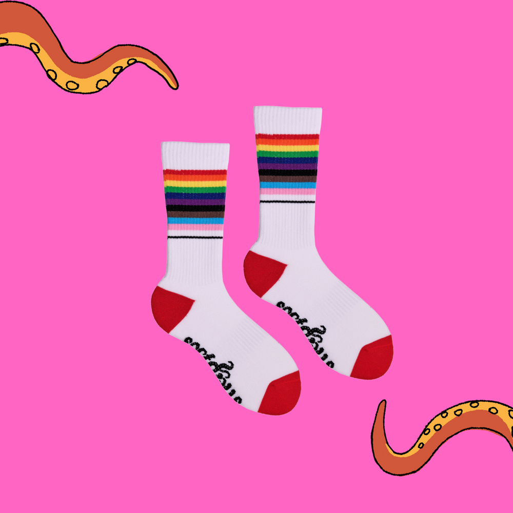 
                      
                        A pair of socks depicting the pride flag. White legs, white cuff, red heel and toe.
                      
                    