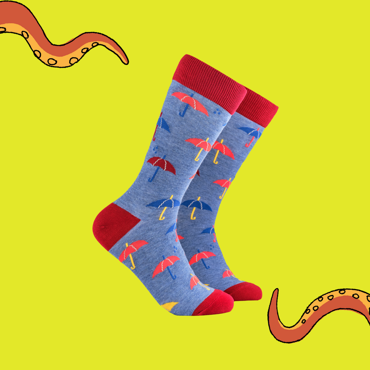 
                  
                    A pair of socks depicting red and blue umbrellas. Blue legs, red cuff, heel and toe.
                  
                