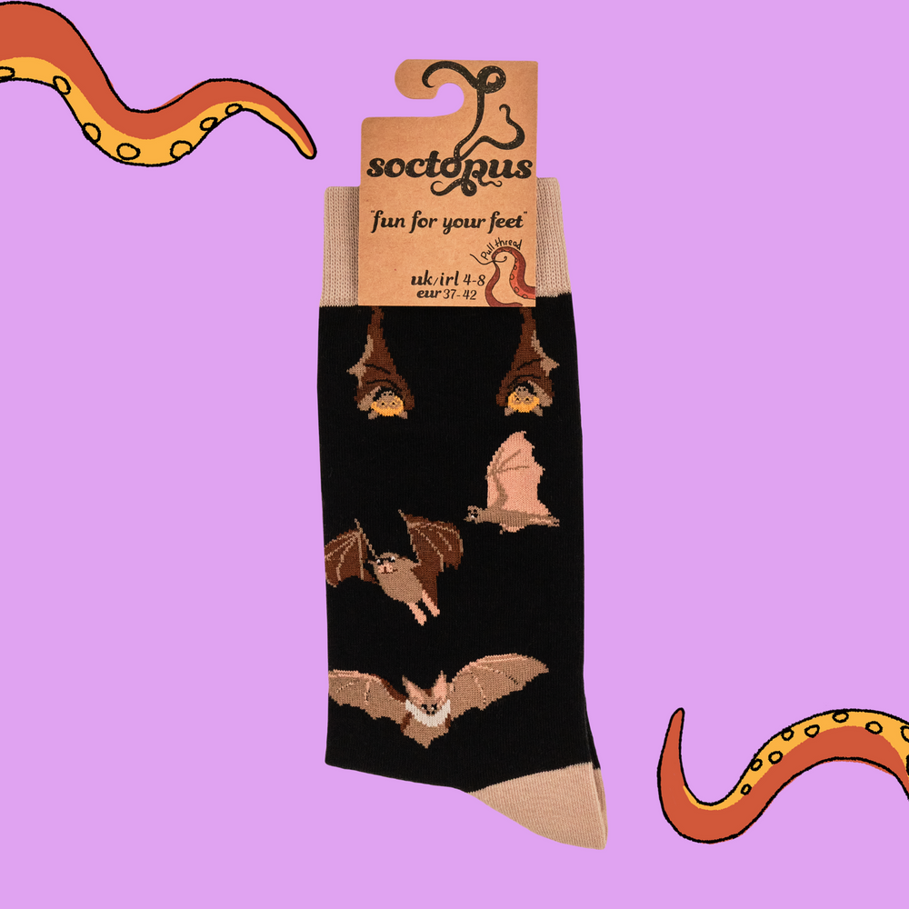 
                      
                        A pair of socks featuring a bat motif. Dark brown legs, light brown heel, toe and cuff. 
                      
                    