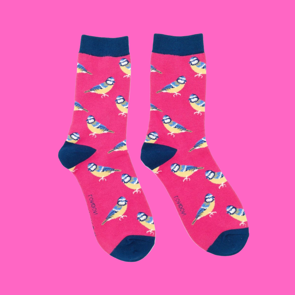 
                      
                        A pair of socks depicting Bluetits. Hot pink legs, navy toe, cuff and heel.
                      
                    