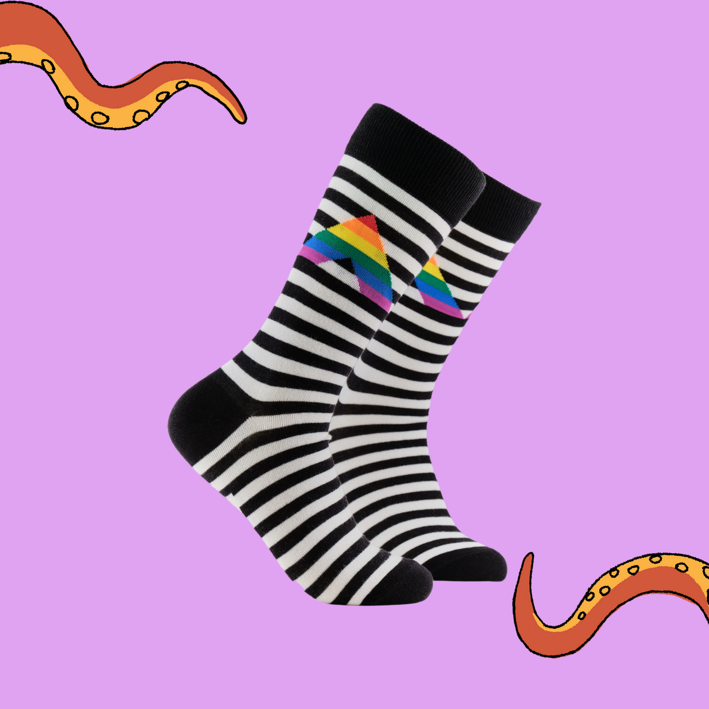 A pair of socks depicting a rainbow ally sign. Black and white striped legs, black cuff, heel and toe.