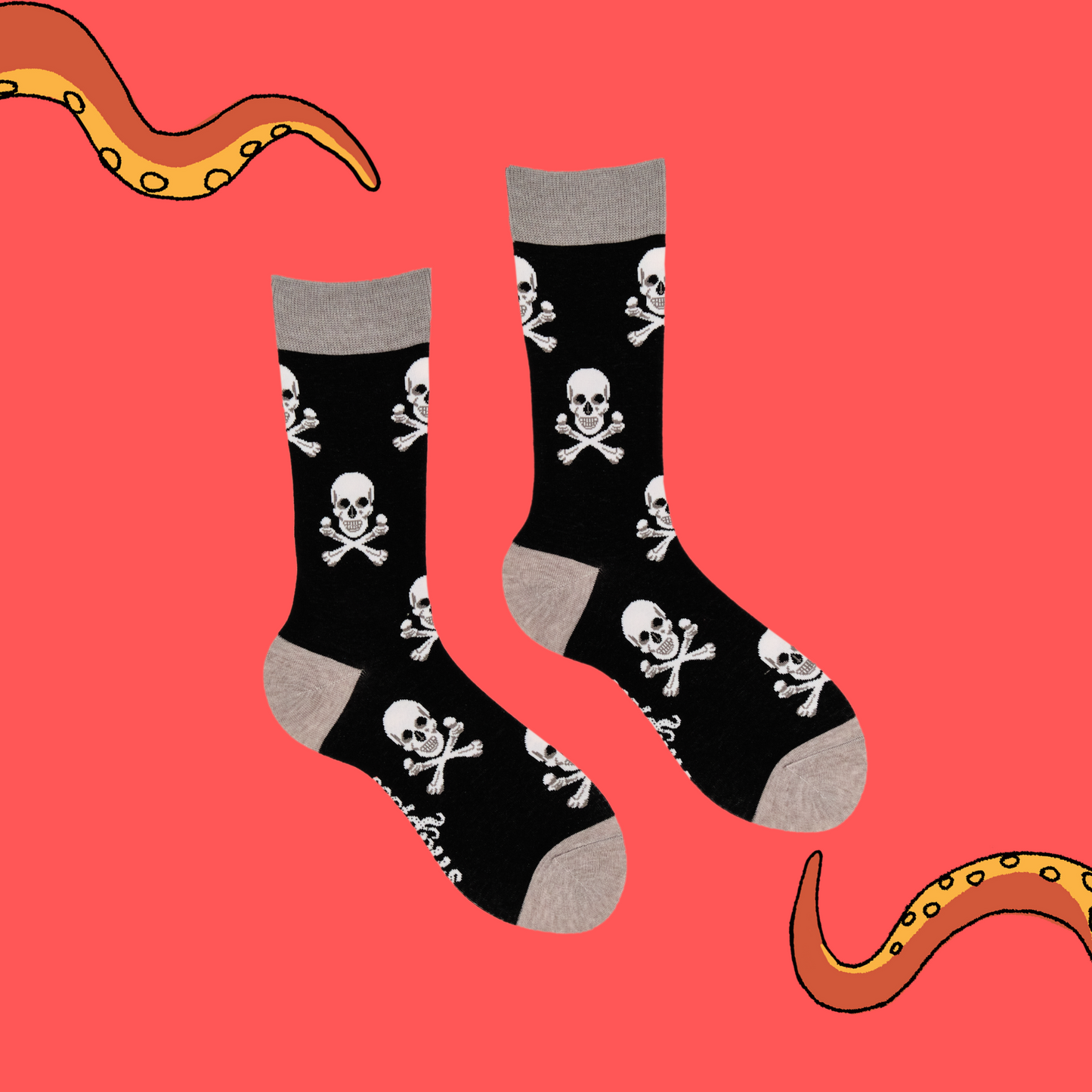 
                  
                    A pair of socks depicting the skull and crossbones. Black legs, grey cuff, heel and toe.
                  
                