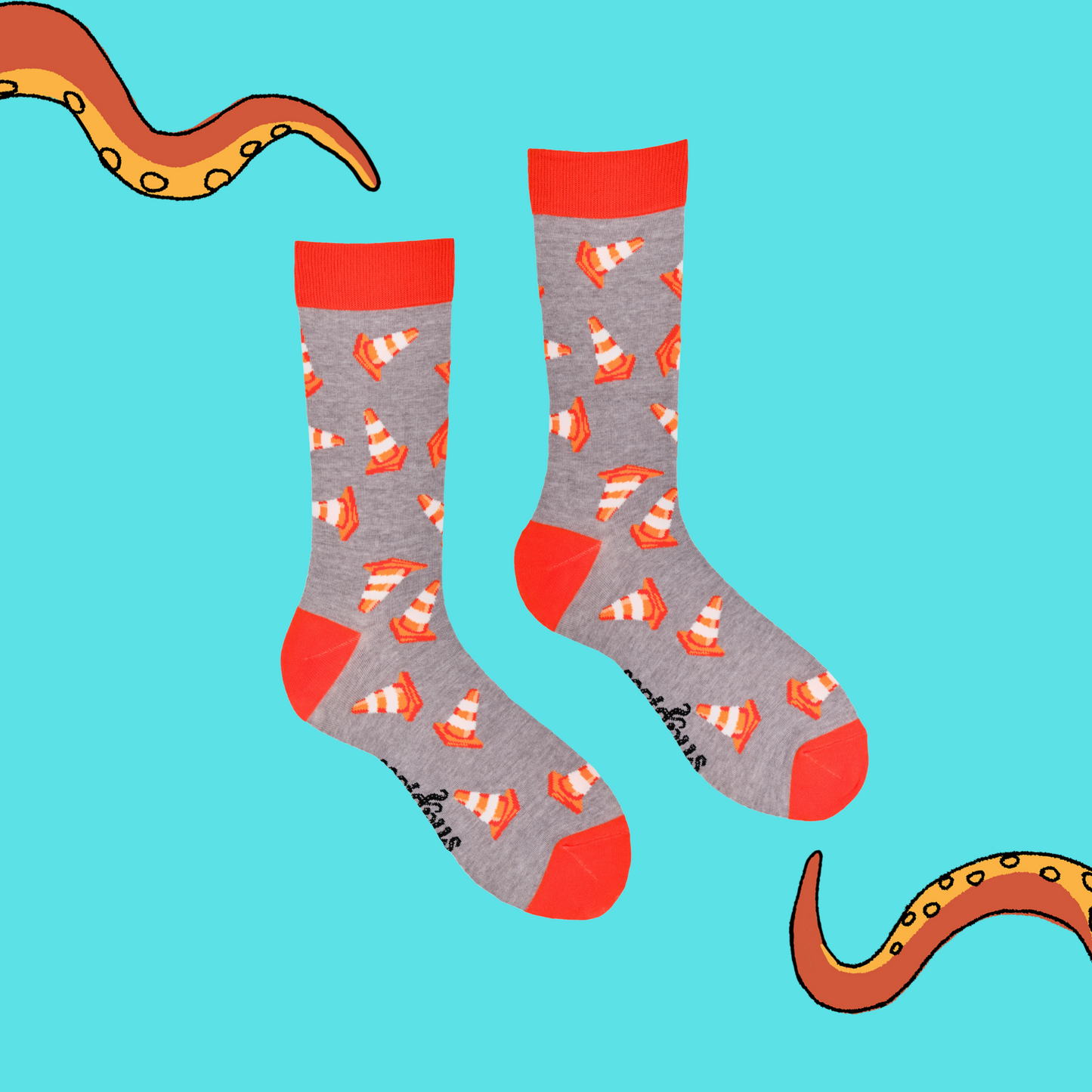 
                  
                    A pair of socks depicting traffic cones. Grey legs, orange cuff, heel and toe.
                  
                