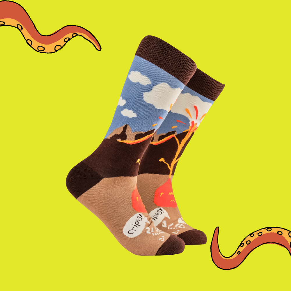 A pair of socks depicting an active volcano. Brown legs, brown heel toe and cuff. 