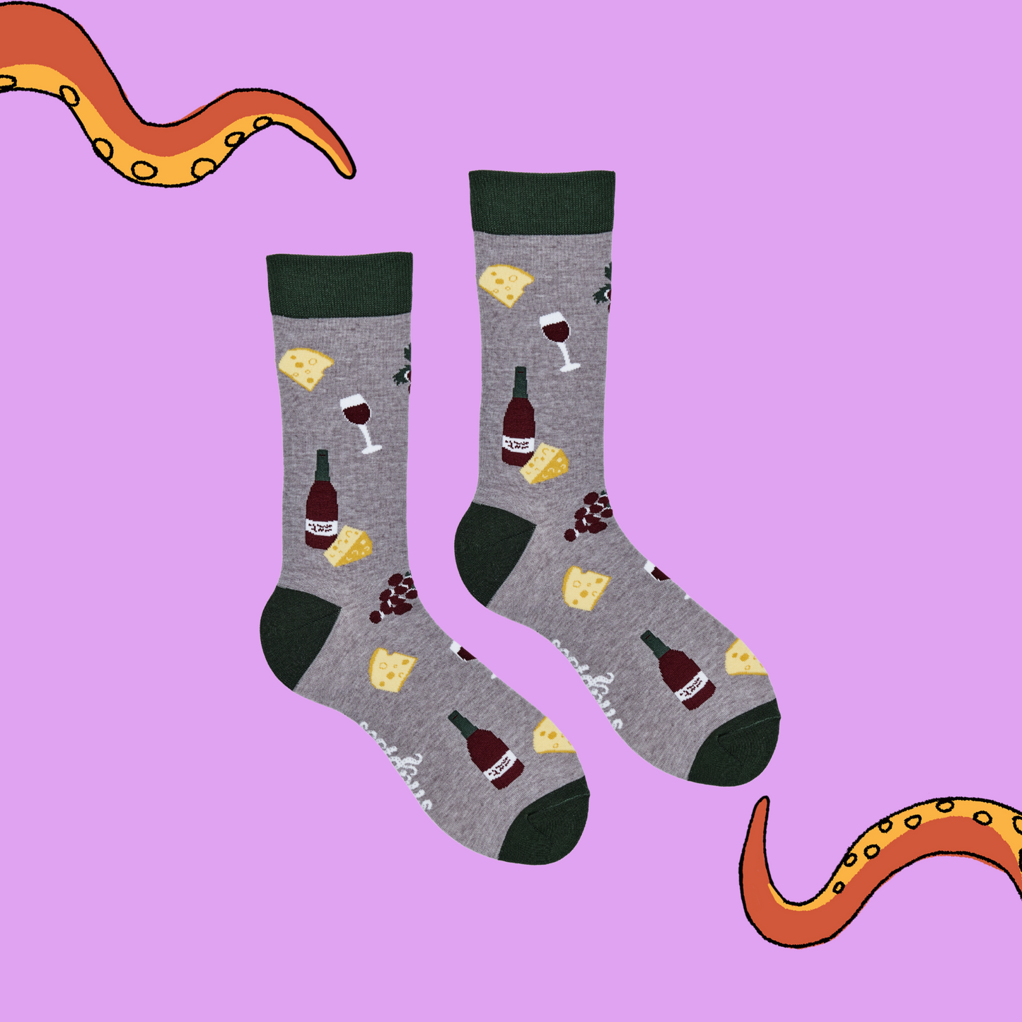 
                  
                    A pair of socks depicting wine, cheese and grapes. Grey legs, green cuff, heel and toe.
                  
                