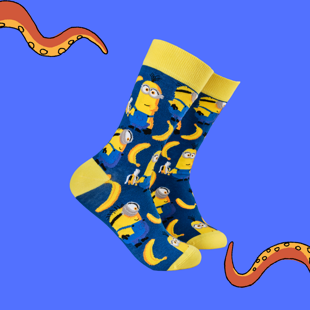 
                      
                        A pair of socks depicting the minions. And bananas. Blue legs, yellow heel toe and cuff. 
                      
                    