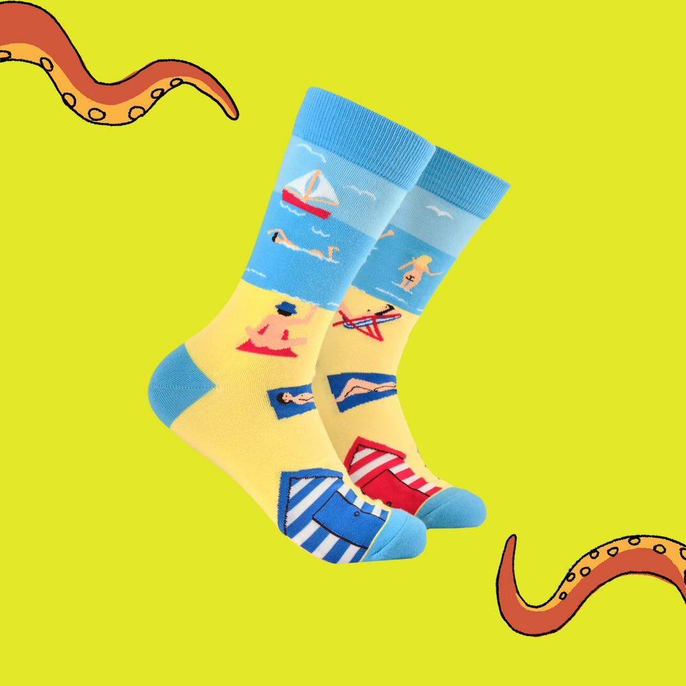 
                      
                        A pair of socks with a fun beach design. Blue heel, toe and cuff. 
                      
                    