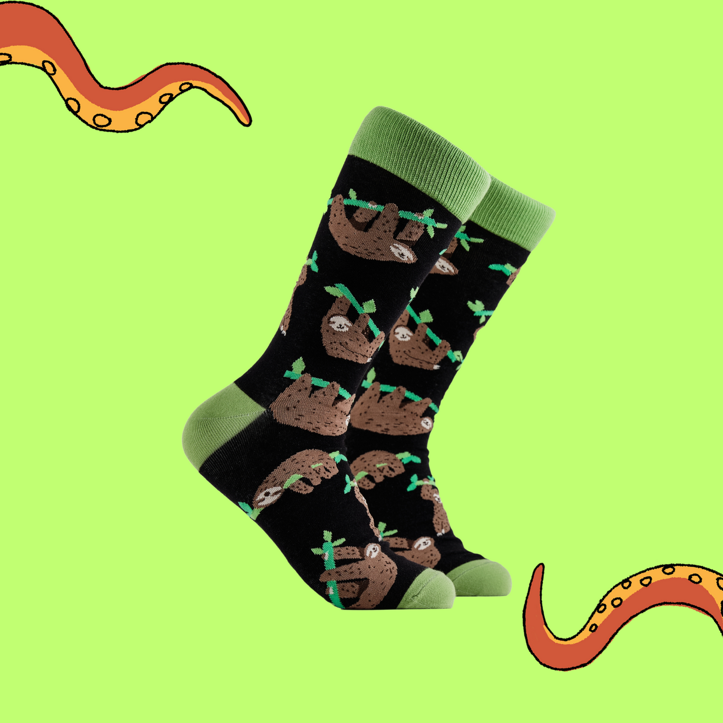 A pair of socks depicting lazy sloths. Black legs, green cuff, heel and toe.