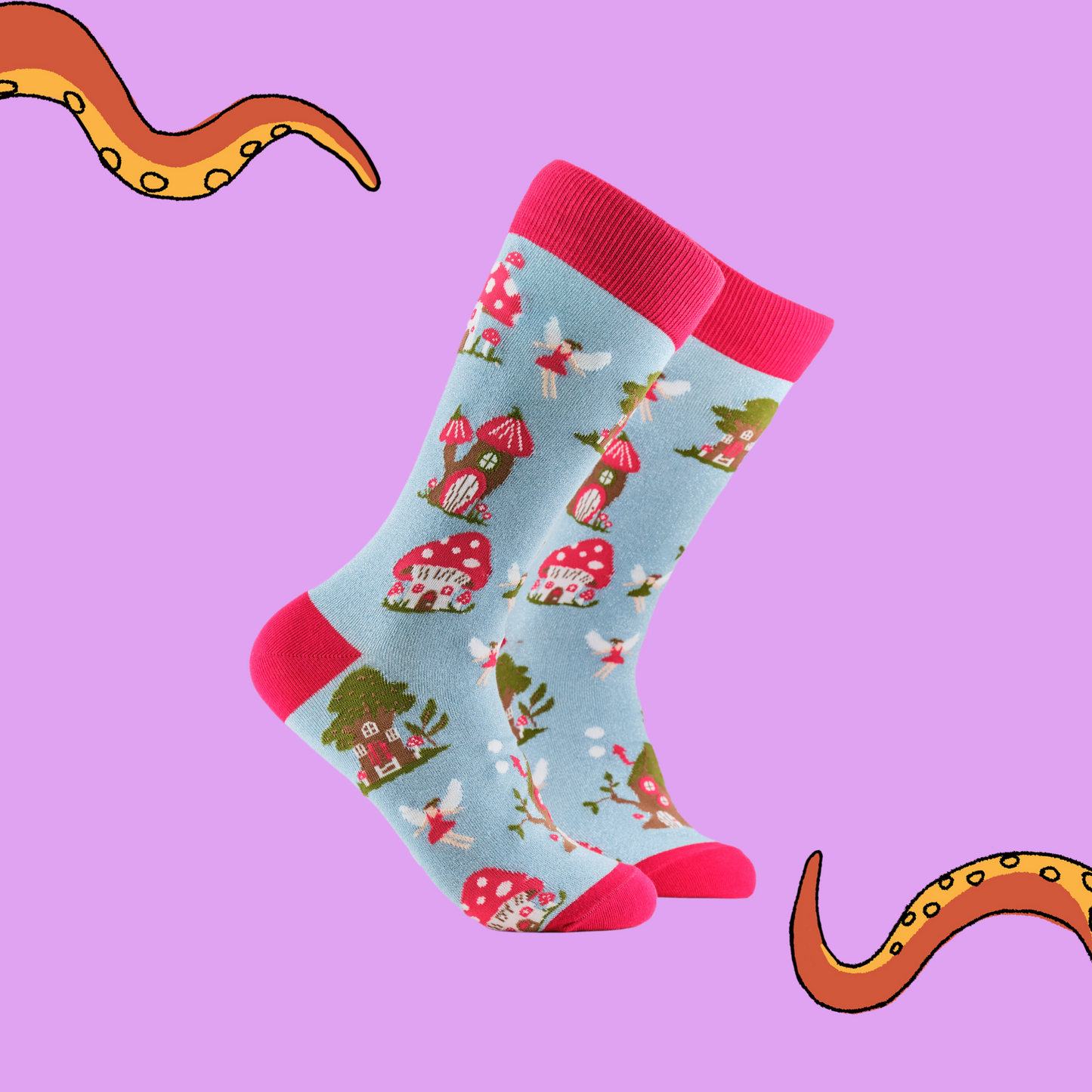  A pair of socks depicting fairies and toadstools. Light blue legs, red cuff, heel and toe.