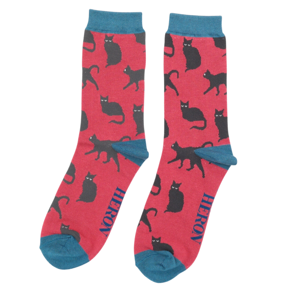 Cute Cats Bamboo Socks - Miss Sparrow. A pair of socks depicting cute black cats. Red legs, blue toe, cuff and heel. 