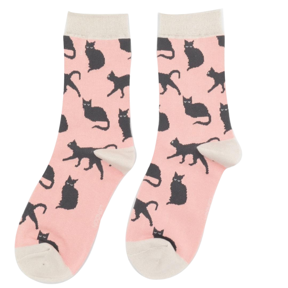 
                  
                    A pair of socks depicting cute black cats. Pink legs, cream toe, cuff and heel.
                  
                