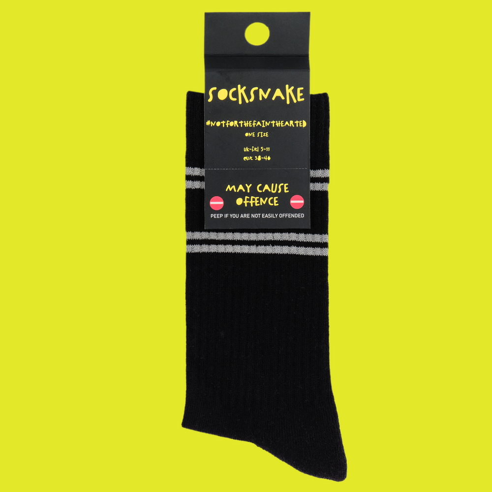 
                      
                        A black pair of athletic socks with white trim on the ankles and toes. A euphemism for the male genitals on the ankle. In socksnake packaging.
                      
                    