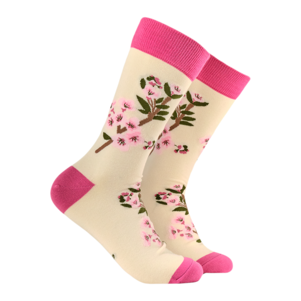 Cherry Blossom Bamboo Socks. A pair of socks featuring cherry blossom. Beige legs, bright pink heel, toe and cuff.