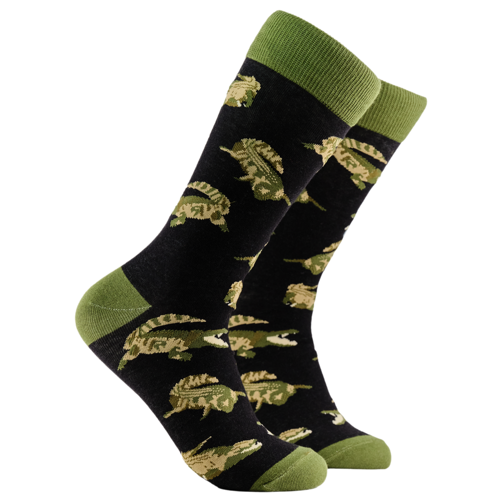 Crocodile Socks - Crocsoc. A pair of socks depicting crocodiles. Dark blue legs, green cuff, heel and toe.