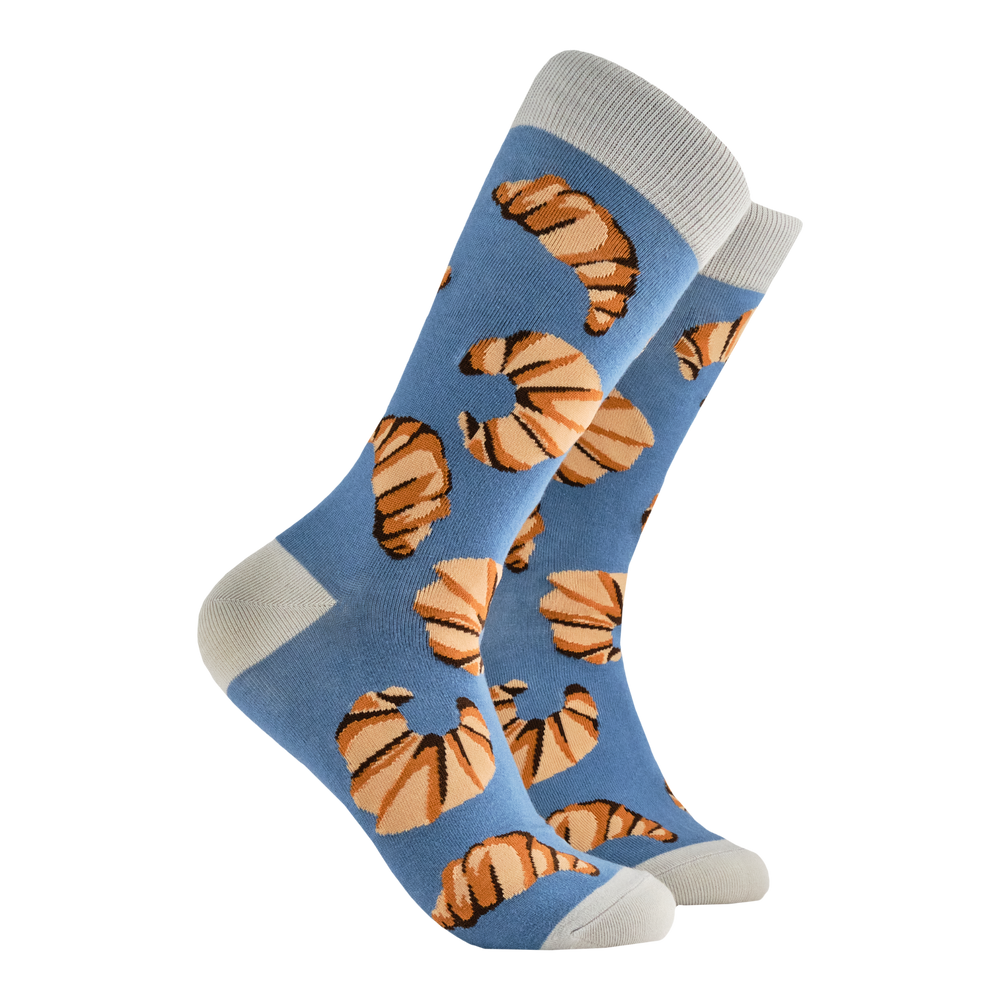 
                      
                        Sweet Treat Socks - Croissants. A pair of socks with a croissant motif. Blue legs, grey heel, toe and cuff. 
                      
                    