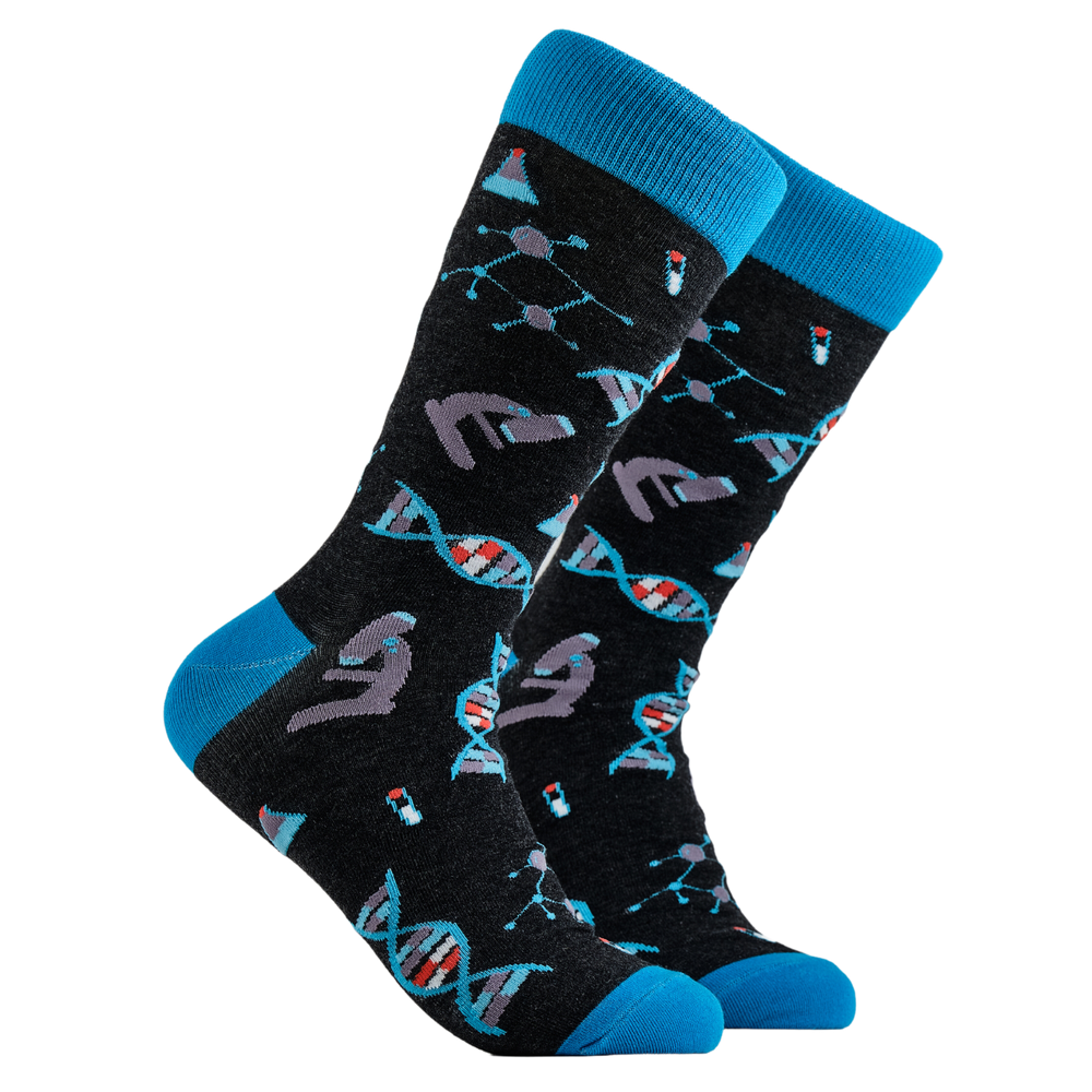 
                      
                        A pair of socks depicting DNA and microscopes. Black legs, light blue cuff, heel and toe.
                      
                    