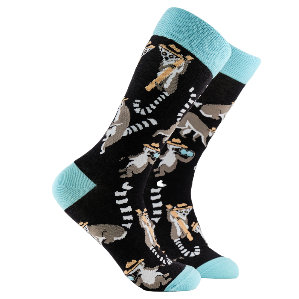 
                      
                        A pair of socks depicting Lemurs being detectives. Black legs, light blue cuff, heel and toe.
                      
                    