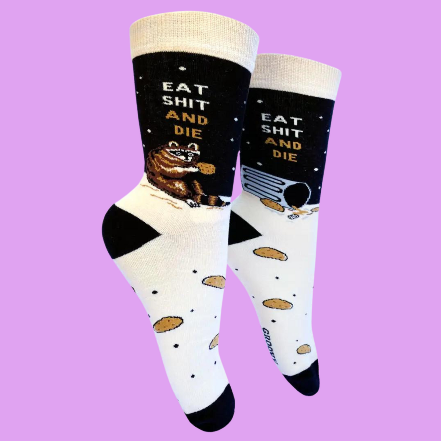 A pair of socks with a bold slogan and racoon eating out of the bin detail. Black toe, cuff and heel.