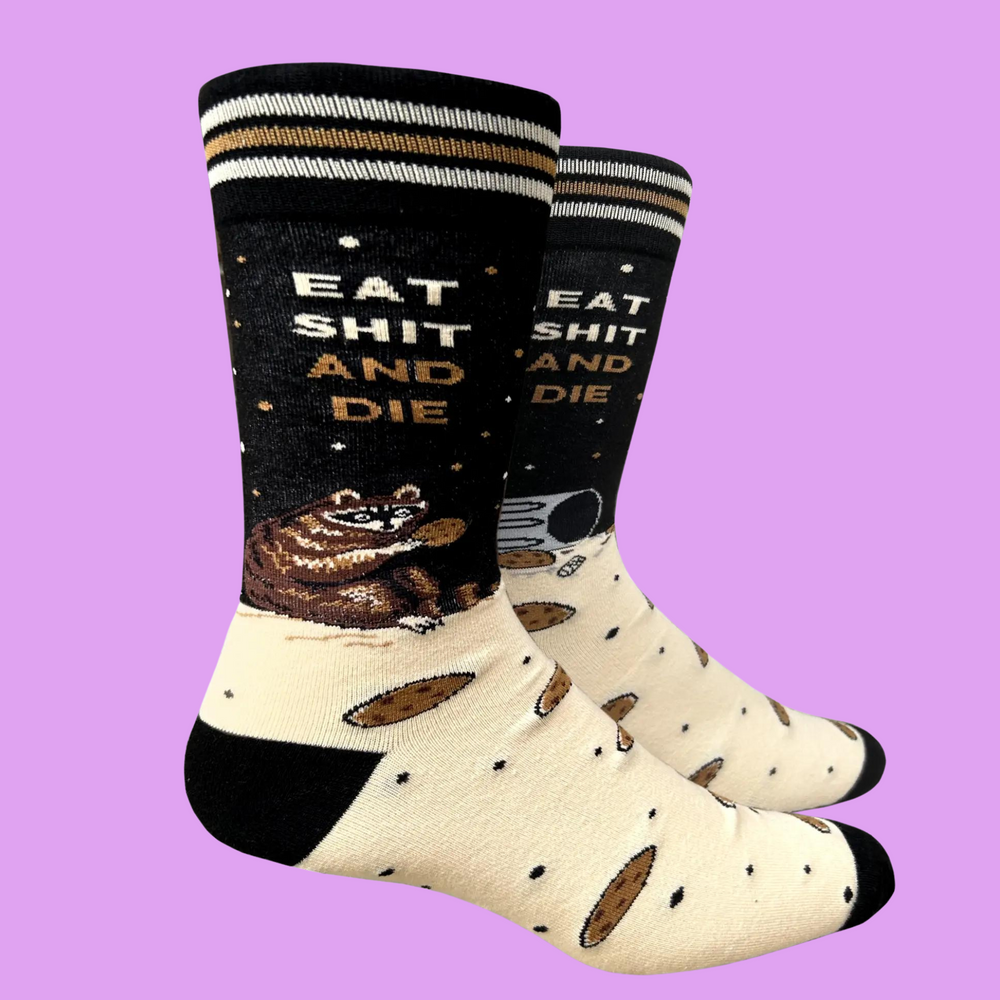 
                  
                    A pair of socks with a bold slogan and racoon eating out of the bin detail. Black toe, cuff and heel.
                  
                