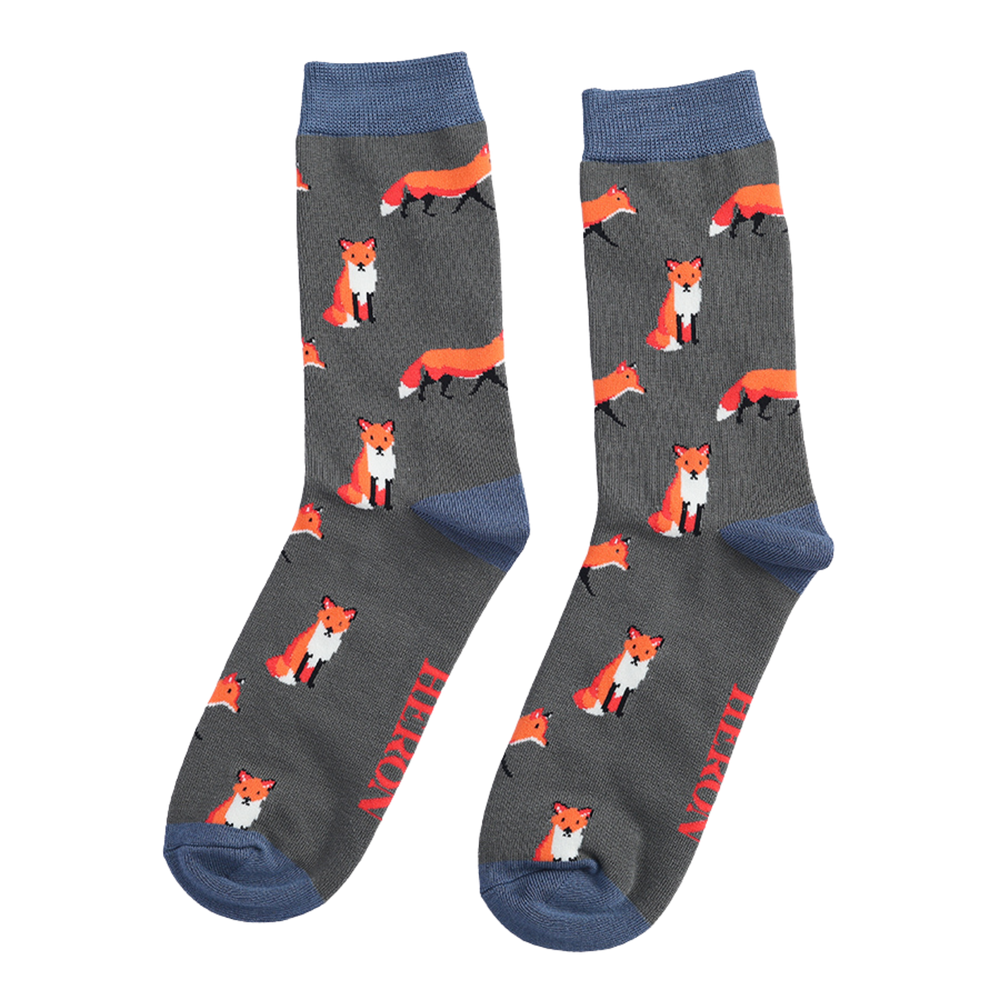 
                  
                    A pair of socks featuring a cute fox design. Grey legs, dark cuff, heel and toe.
                  
                