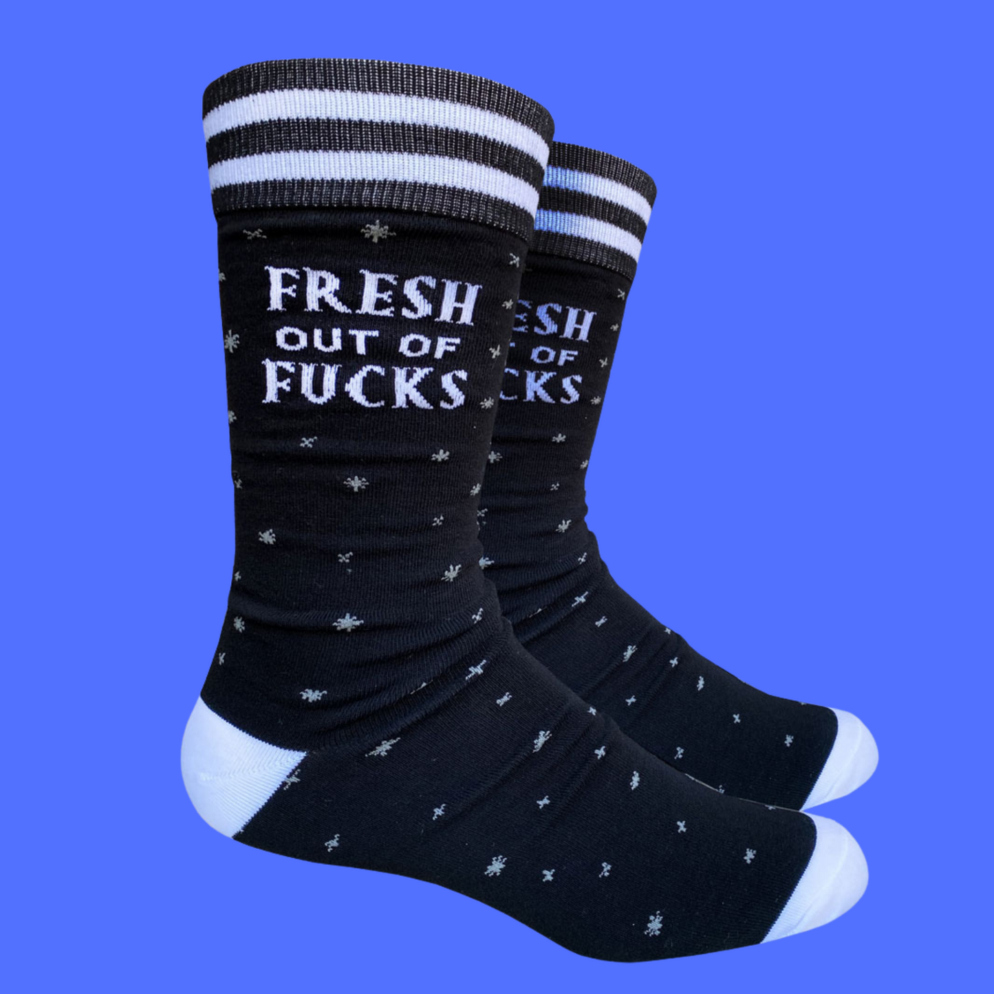 
                  
                    Fresh out of F**ks Socks. A pair of socks with a bold slogan and simple black and purple stars design. Purple toes, heel and cuff.
                  
                