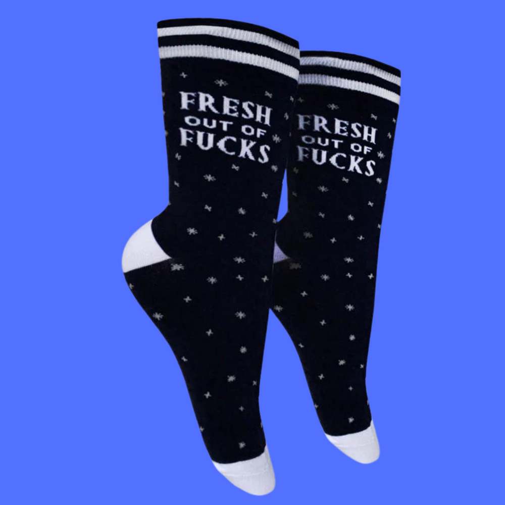 
                      
                        Fresh out of F**ks Socks. A pair of socks with a bold slogan and simple black and purple stars design. Purple toes, heel and cuff.
                      
                    