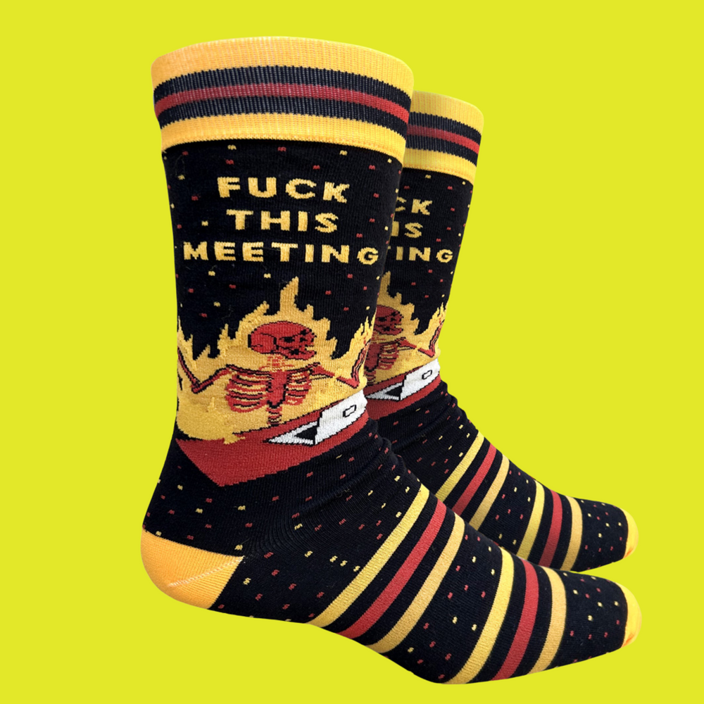 A pair of socks with a cool burning skeleton motif and a bold sweary slogan. Yellow and red details.