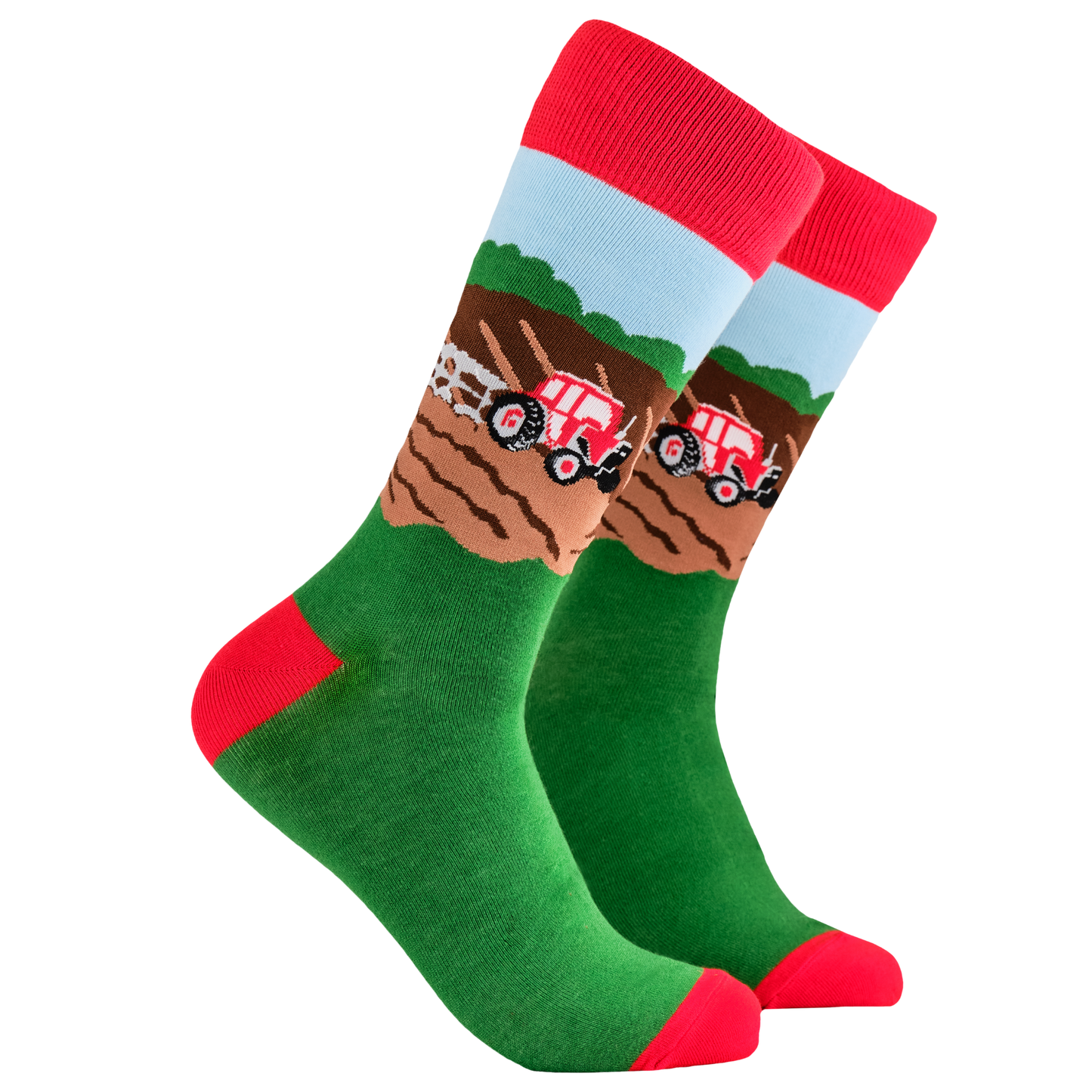 Farming Life Socks. A pair of socks depicting farm life and tractor plowing the field.. Green legs, red cuff, heel and toe.