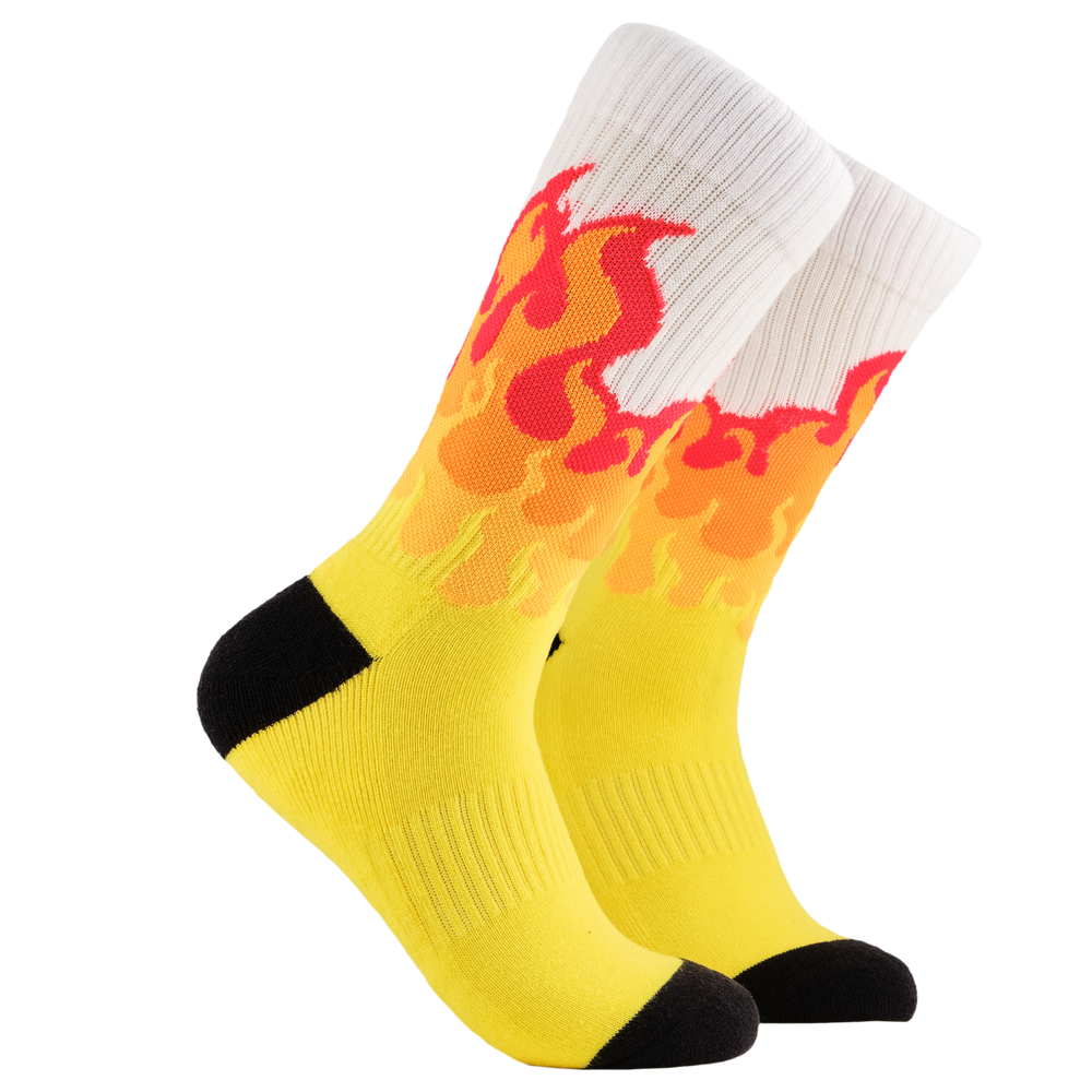 Flames Athletic Socks. A pair of socks depicting rising flames. Yellow legs, white cuff, black heel and toe.