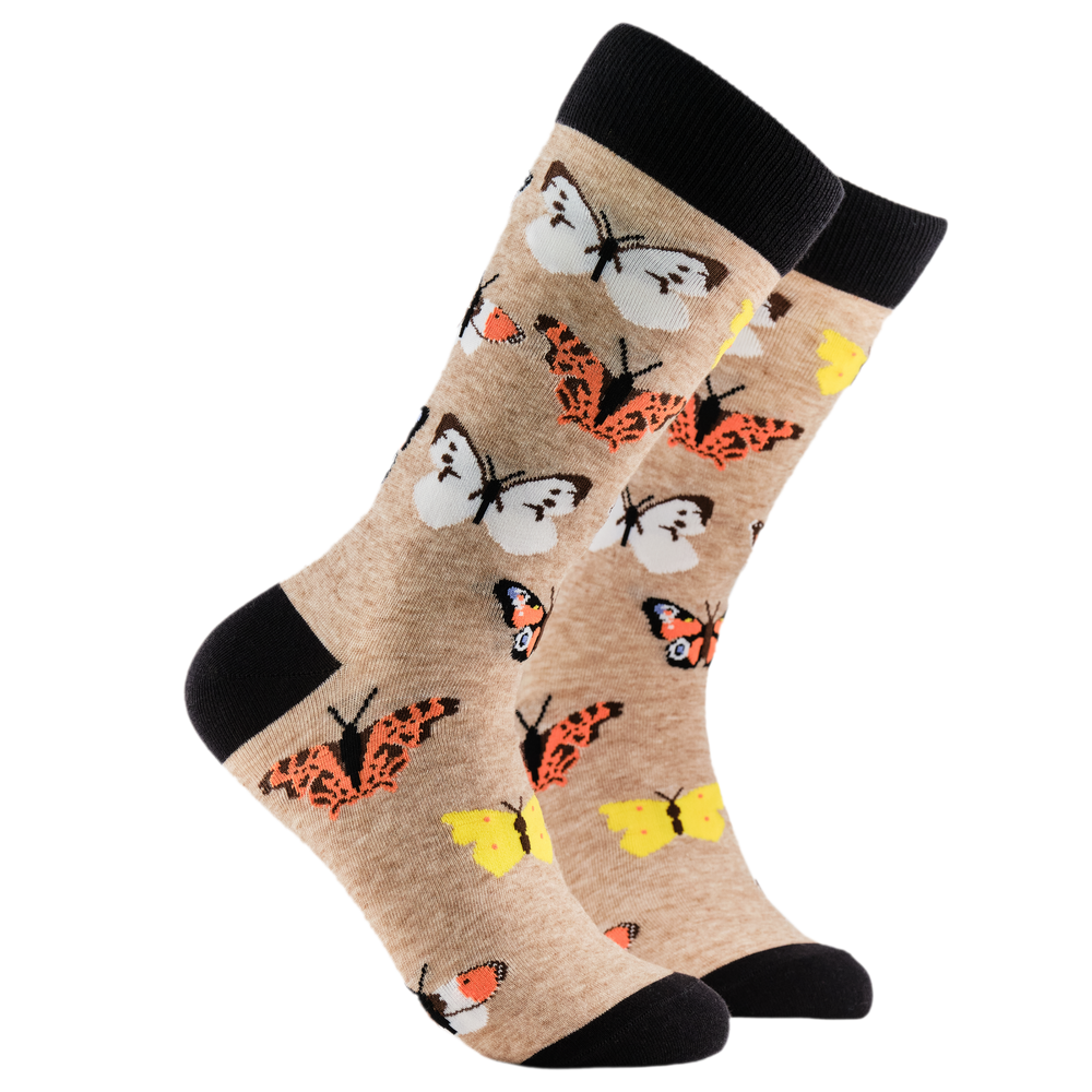 
                  
                    Butterfly Socks - Flutterbyes. A pair of socks depicting native British butterflys. brown legs, black cuff, heel and toe.
                  
                