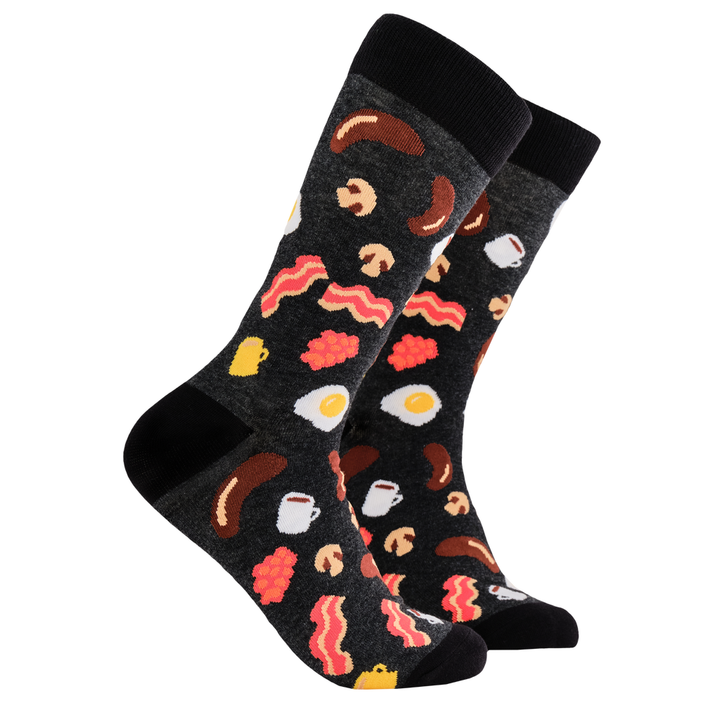 Full English Breakfast Socks. A pair of socks depicting English breakfast ingredients. Grey legs, black cuff, heel and toe.