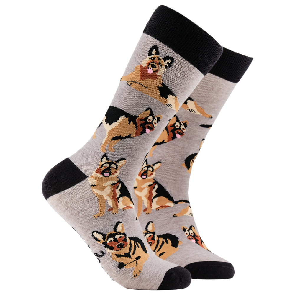 Dog Socks - German Shepherd. A pair of socks depicting German Shepherd dogs. Grey legs, black cuff, heel and toe.