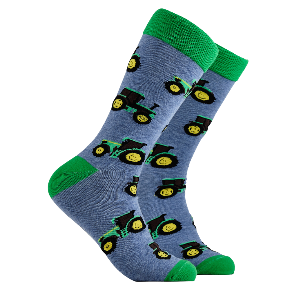 Farming Socks - Green Machine. A pair of socks depicting green tractors. Blue legs, green cuff, heel and toe.