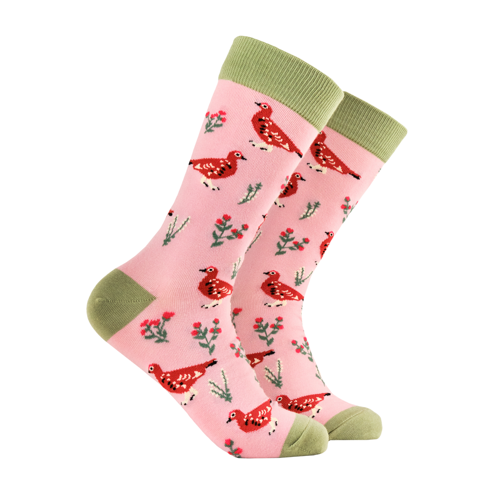 
                      
                        Grouse Socks. A pair of socks featuring a grouse motif. Pink legs, green heel, toe and cuff. 
                      
                    