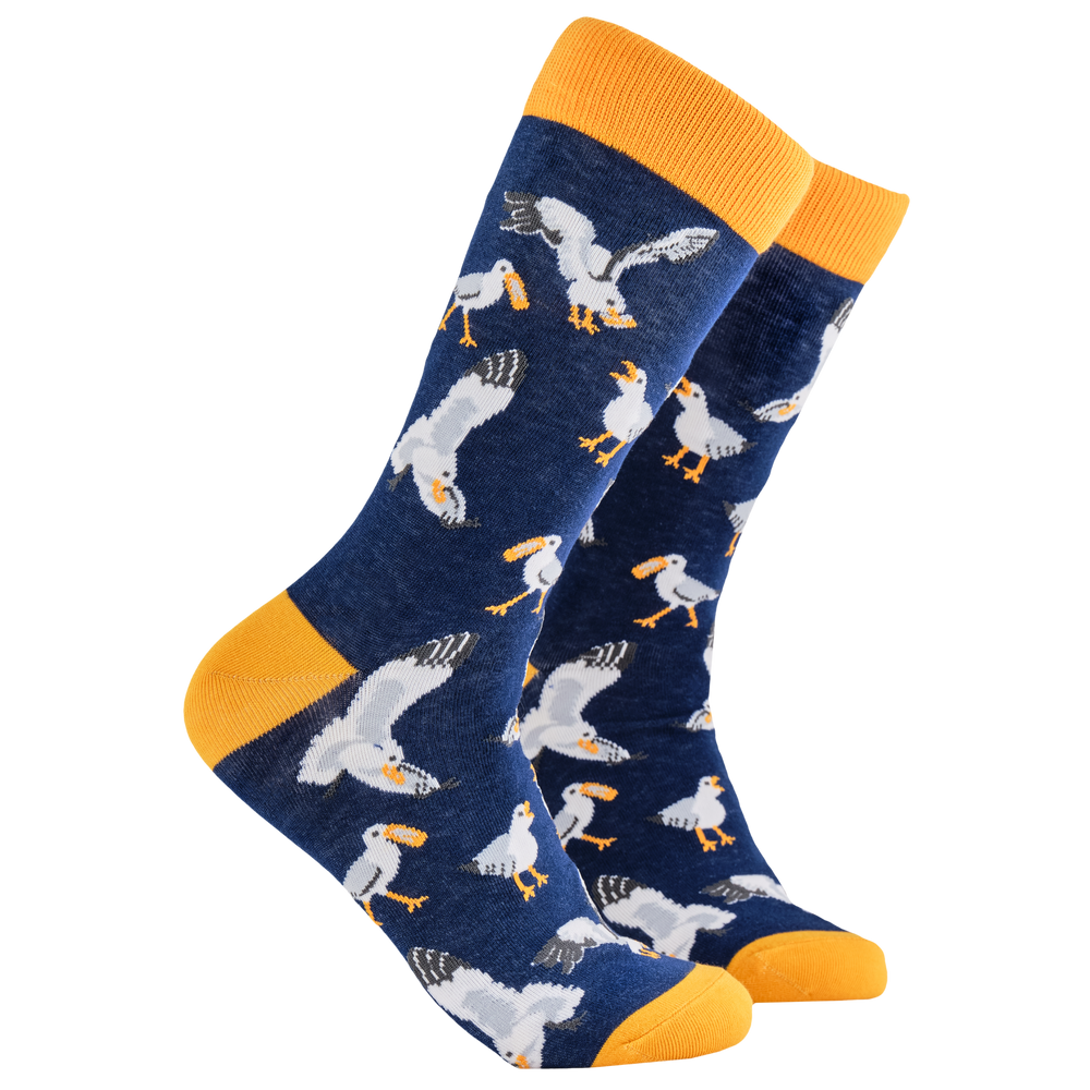 Seagull Socks - Gull Got My Socks. A pair of socks depicting seagulls eating chips. Blue legs, yellow cuff, heel and toe.