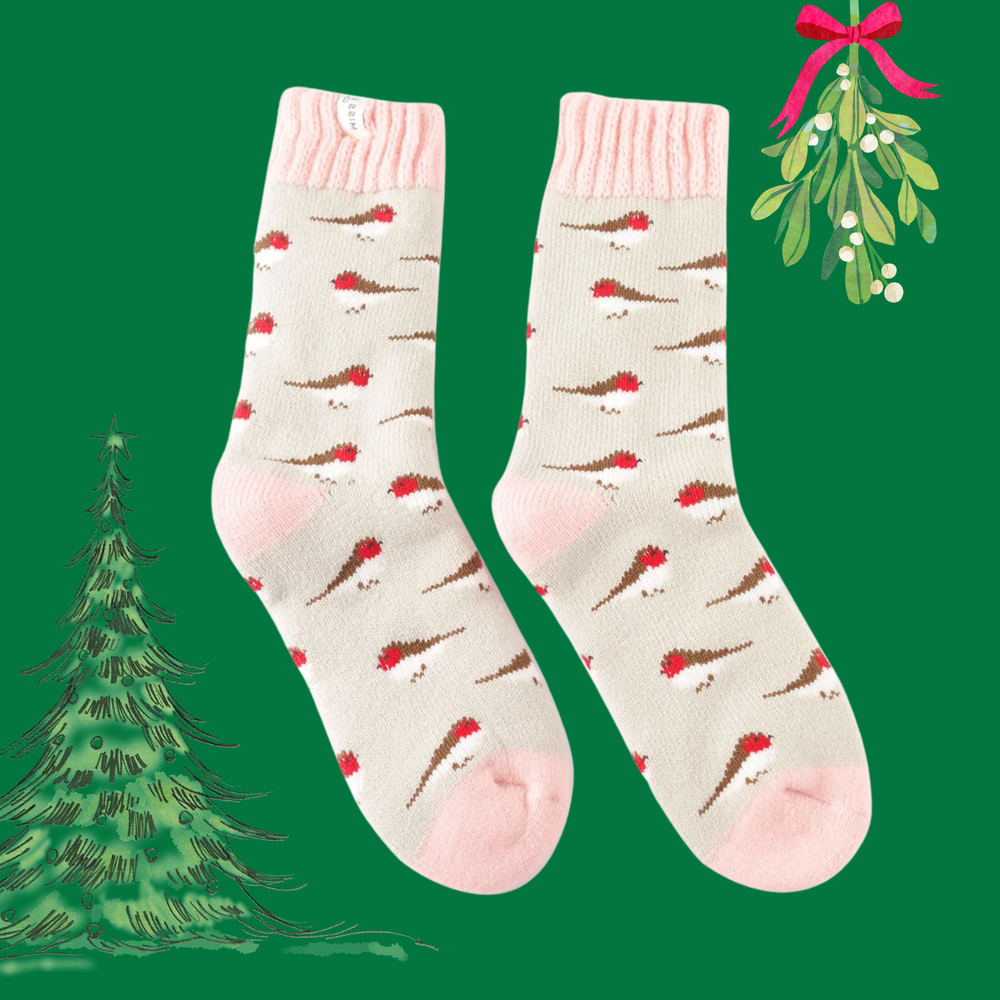 
                      
                        A pair of winter socks depicting little robbins. Pink heel, toe and cuff. 
                      
                    