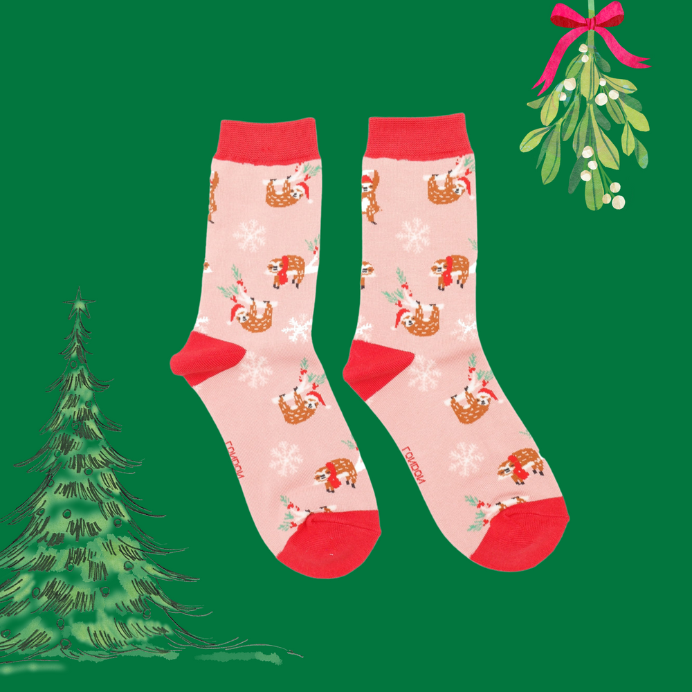 
                      
                        A pair of socks depicting xmas sloths wearing santa hats. Pink legs, red heel, toe and cuff. 
                      
                    