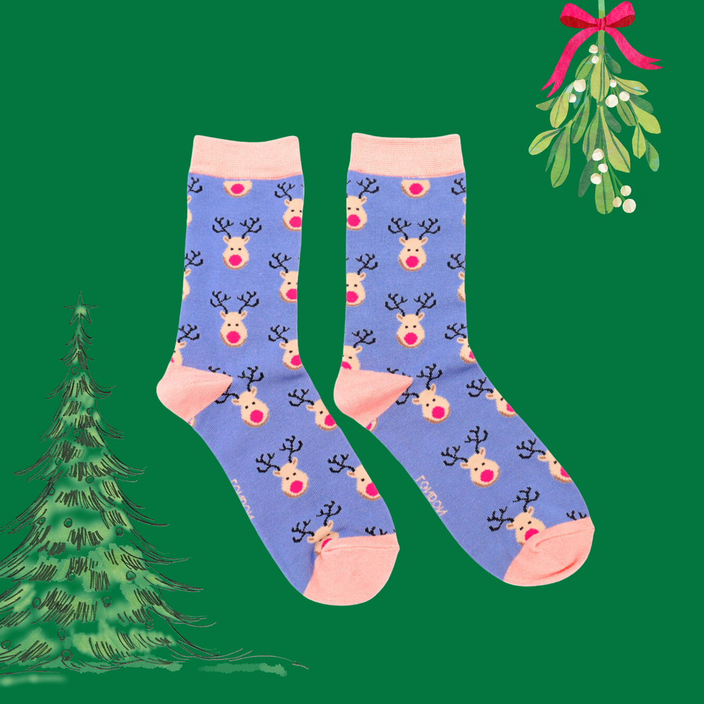 
                      
                        A  pair of socks with a festive reindeer pattern. Blue legs, light pink heel, toes and cuff.  
                      
                    