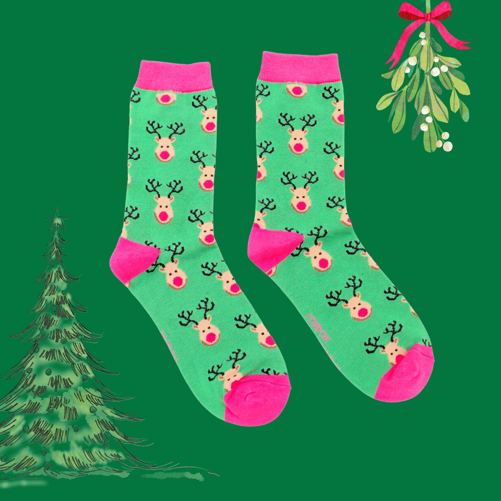 
                      
                        A  pair of socks with a festive reindeer pattern. Bright green legs, pink heel, toes and cuff.  
                      
                    