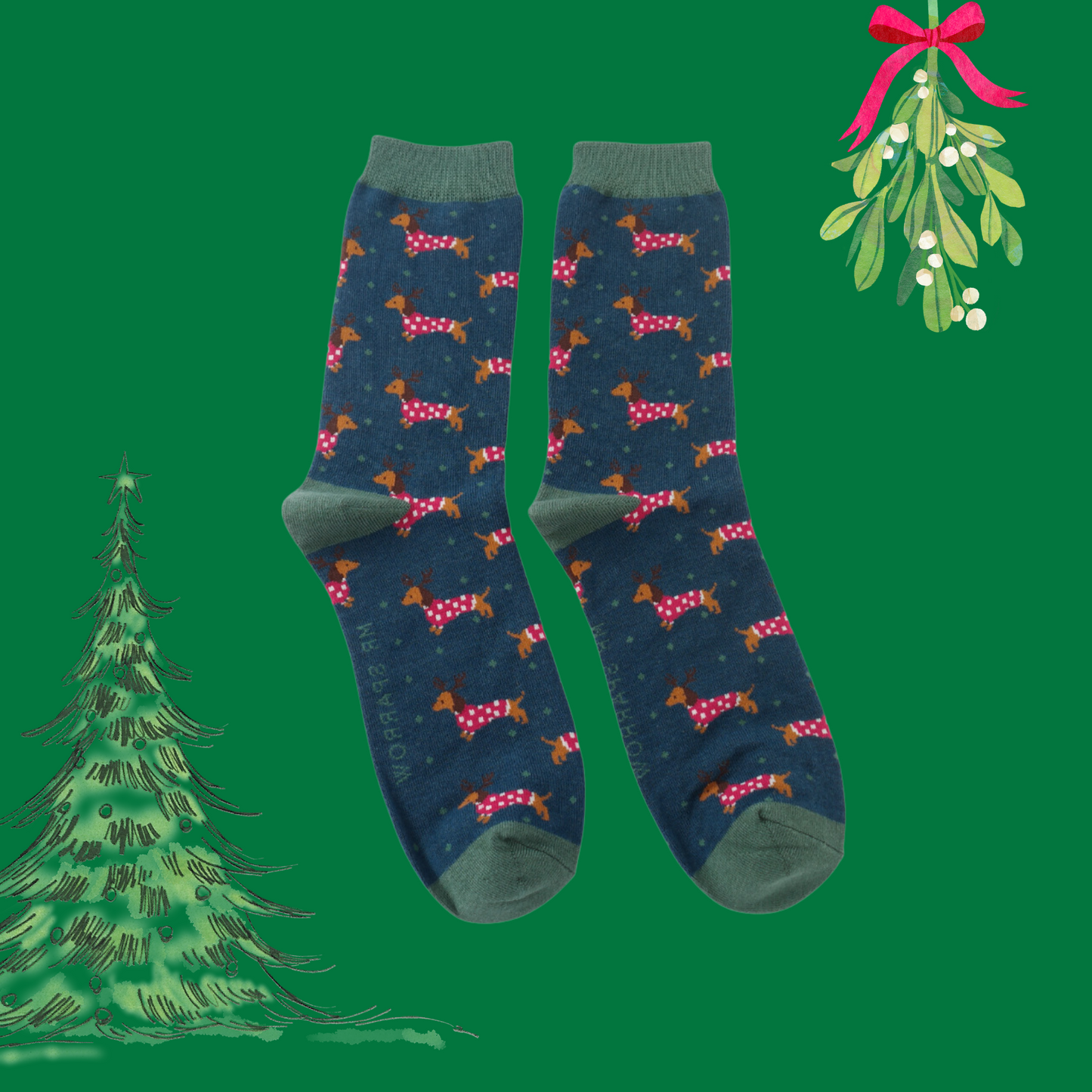 A pair of socks with a festive sausage dog pattern. Dark blue legs, dark green heel, toe and cuff. 